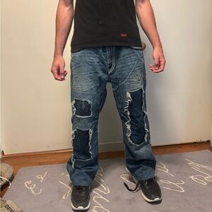 Men's Distressed True Religion quad stitched Blue Jeans